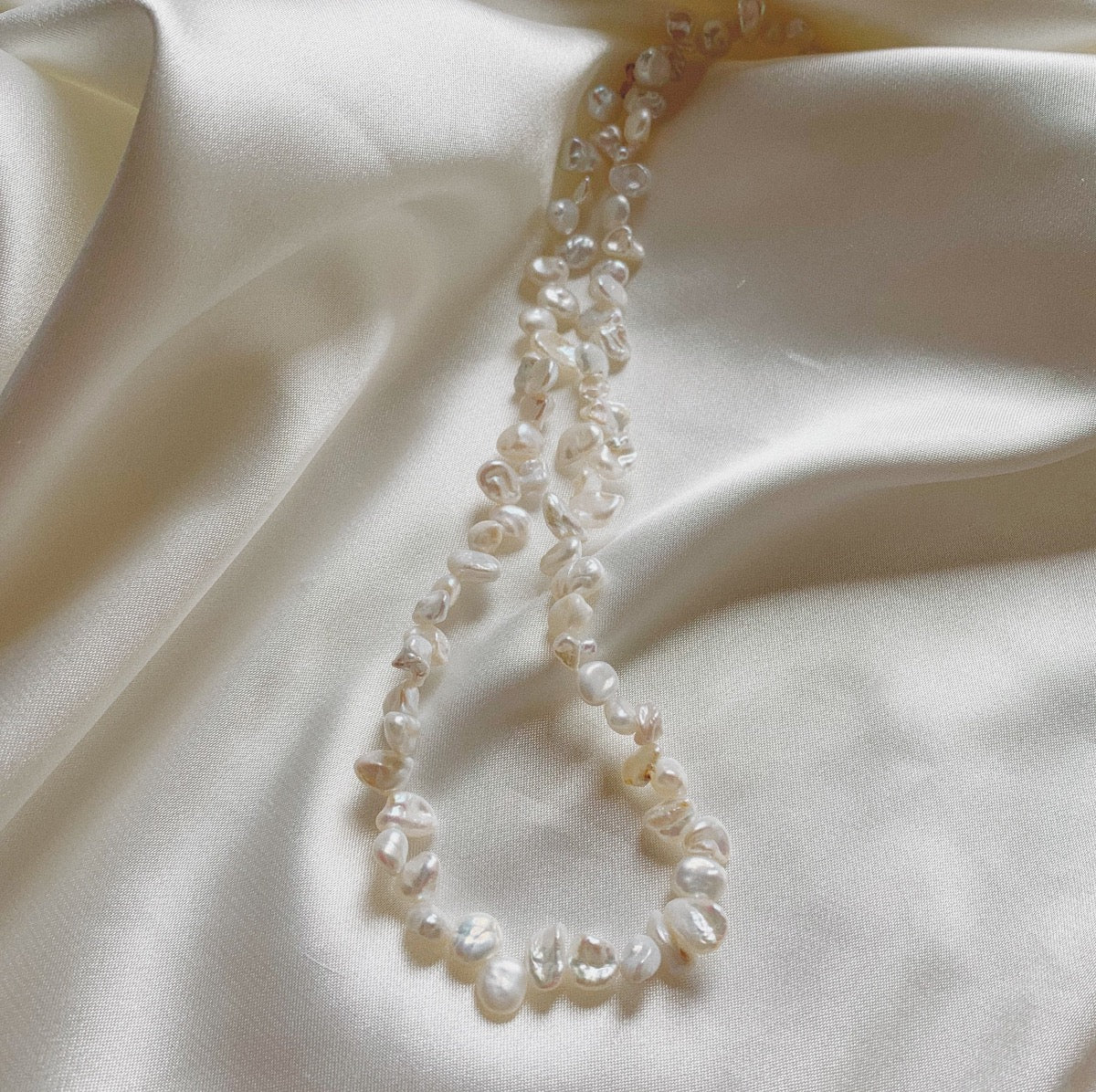 Uneven hot sale pearl necklace